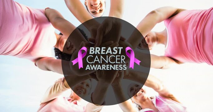 Animation of pink ribbon logo with breast cancer text over diverse group of smiling women