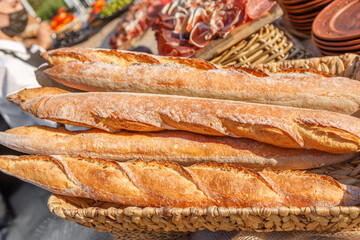 Freshly baked loaves of bread with a toasted crispy crust.
