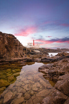 Amazing lighthouse in the Portuguese coastline at the sunset.