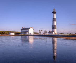 Bodie Island Lighthouse is located at the northern end of Cape Hatteras National Seashore, North...