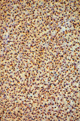 Close-up of rusty metal with holes for background and texture