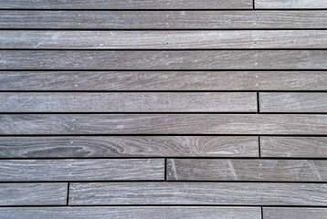 Obraz premium Texture of wooden plank background from parallel planks, top view