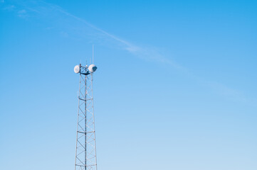 telecommunication towers with blue sky
