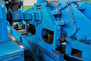 Large gears of blue agave grinding machine to produce tequila