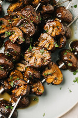 Marinated and grilled Cremini mushroom skewers