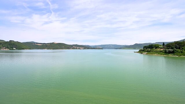 corbara lake in umbria bathing place with beaches on a sunny day in su