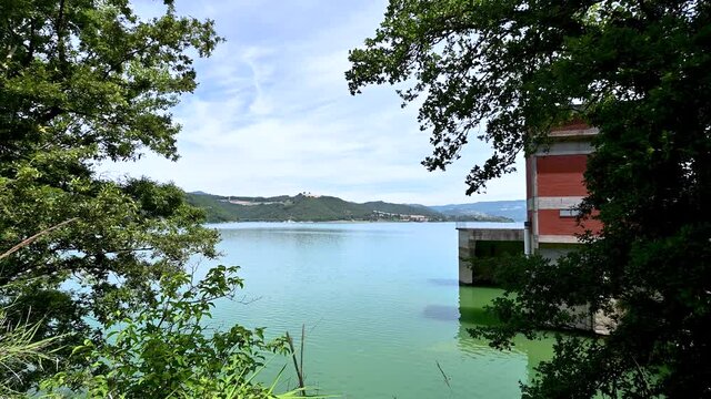corbara lake in umbria bathing place with beaches on a sunny day in su