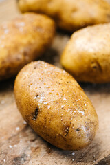 Cleaned, salted gold potatoes ready for cooking