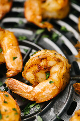 Closeup of golden spicy air fried shrimp