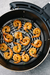 Golden shrimp cooked in an air fryer