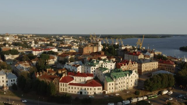 Aerial shot of Vyborg historic town centre and the sea port in the evening, Russia