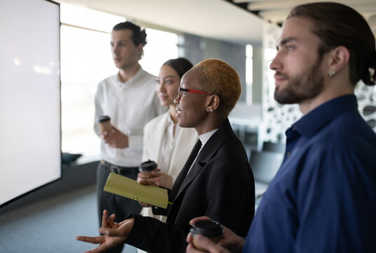Black woman speaking during video conference with colleagues