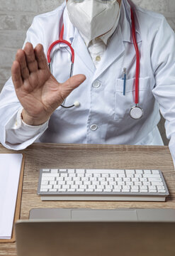 Patient doctor consultant using video chat in clinic.