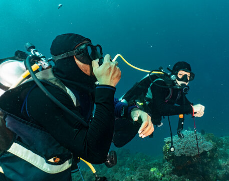 divers sharing air in emergency training in Raja Ampat / Indonesia