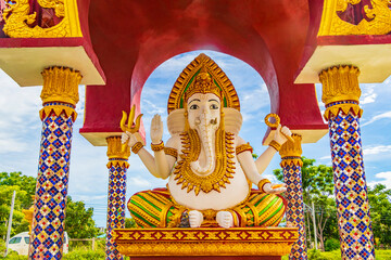 Colorful elephant god statue architecture Wat Plai Laem temple Thailand.