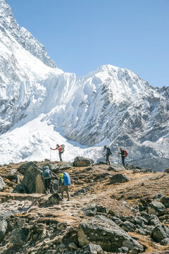 Climbers crest a ridge en route to Everest Basecamp