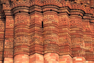 Intricate detail of the Qutub Minar red sandstone tower (minaret), Delhi, India.