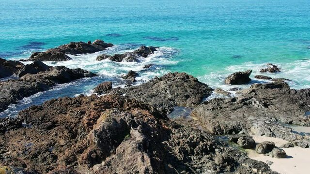 Aquamarine tropical blue sea and rocks