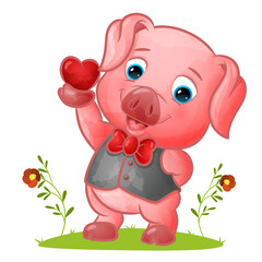 The tidy pig with the vest and ribbon tie holding a small love