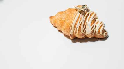 Croissants in a bakery shop. freshly baked croissants on texture background.	