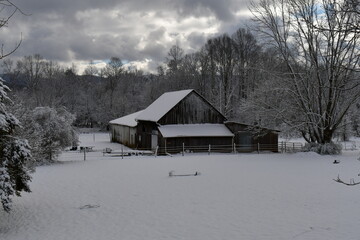 Old barn in the snow on a Tennessee farm