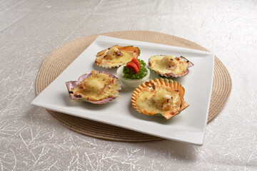 baked cheese cream scallop in shell foie gras canapés in white background asian halal seafood menu