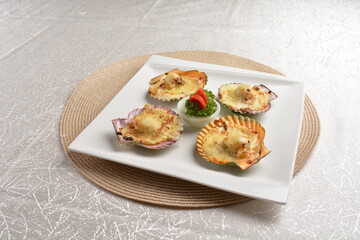 baked cheese cream scallop in shell foie gras canapés in white background asian halal seafood menu