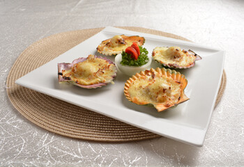 baked cheese cream scallop in shell foie gras canapés in white background asian halal seafood menu