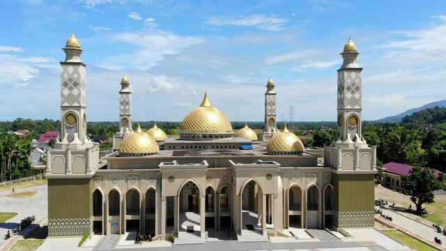 aerial video of the Baitul Ghafur Grand Mosque in southwest Aceh seen straight from the front with the drone moving upwards