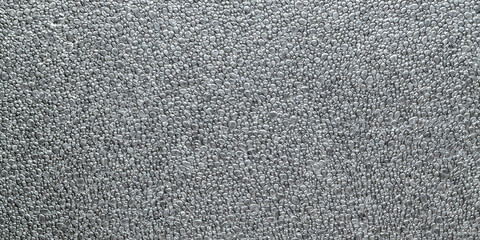 Black grain background. Gray wall for board background. Grey styrofoam foam texture or white plastic polystyrene pattern.