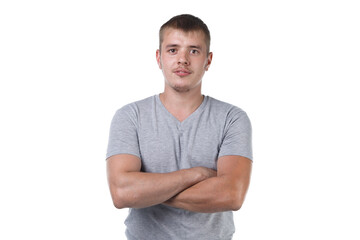 Photo of young man with bristle and arms crossed