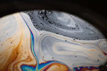 the beauty of the colorful pattern of soap bubbles is like a small planet