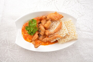 deep fried soft shell whole crab with spicy chilli crab sauce dip and crackers in white background asian halal seafood menu