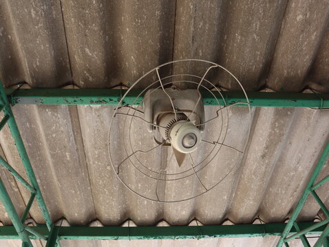 A Ceiling Fan With A Broken Impeller