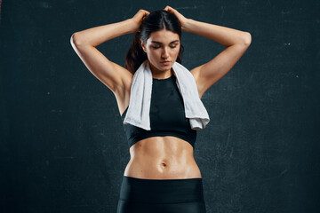 sports woman slim figure motivation workout dark background