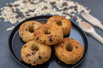 sweet home made chocolate chip donuts on a table