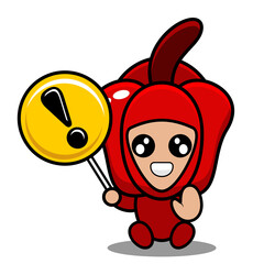 Naklejka premium vector cartoon character red pepper vegetable mascot costume sitting holding a warning sign