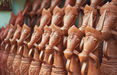 Famous terracotta horse sculptures of Bishnupur, West Bengal. On retail display for sale.