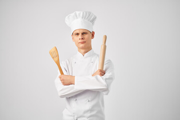 male chef in uniform restaurant work cooking