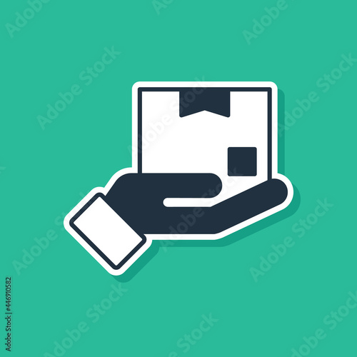 Blue Delivery Hand With Cardboard Boxes Icon Isolated On Green Background Door To Door Delivery By Courier Vector Wall Mural Oksana