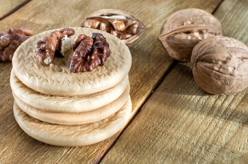 Obraz na płótnie Canvas cookies grain walnut and walnut, on a wooden table