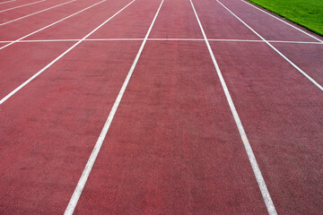 Fototapeta premium Running track at the stadium close up.