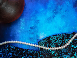 blue background for cosmetics white pearl beads