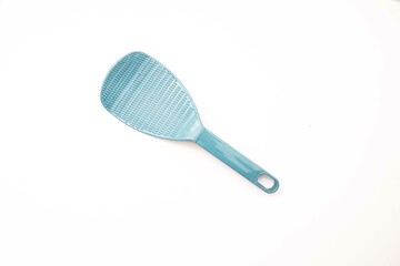 plastic rice paddle spoon isolated on a white background