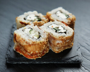 Japanese food rolls with fish and avocado