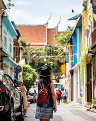 Obraz na płótnie Canvas Girl exploring Phuket old town