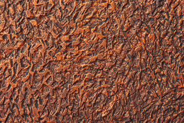 Decorative plaster close up. Texture of concrete wall. Concrete is made in the form of rubbed iron.