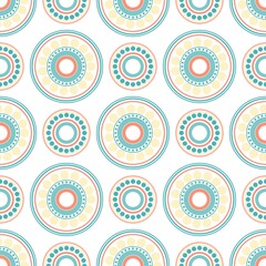 Seamless abstract pattern of circles and dots of pink and turquoise colors.