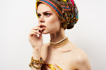 woman in multicolored turban decoration cosmetics makeup fun