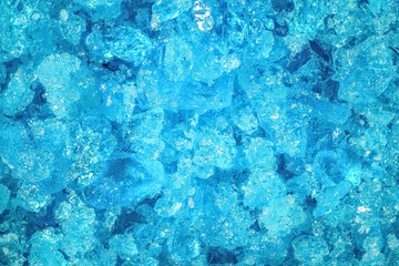 Blue copper sulphate crystals under 4x microscope magnification - image width = 8mm